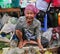 People selling vegetables and fruits at market in Kep, Cambodia