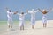 People Seniors Family Generations Jumping on Beach