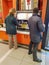 People serving carbonated drinks in the burger king