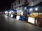 People setting their street market shops in tourist destination: NIGHT MARKET middle of LUANG PRA BANG