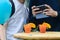 People shooting photo of cold summer orange cocktails in glasses