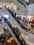 People shoppers on the escalator at the Mall on black Friday during Christmas and new year discounts and sales photo taken by pho