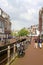 People are shopping along a canal in Leeuwarden, Friesland, Netherlands