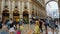 People shopping in ancient Galleria Vittorio Emanuele, oldest active mall, Italy