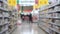People with shopping carts. People are shopping in a supermarket, defocused blurred background