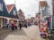 People and shops in main street Haven in Volendam, Noord-Holland, Netherlands