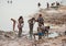 People on the shore of the Dead Sea