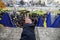 People show the Victory Sign from the balcony where Nicolae Ceausescu held his last speech during the Romanian anti communist