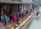 People are sightseeing along the riverside in water town Wuzhen (Unesco), China