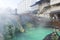 People sightseeing at Yubatake Hotspring with evening light in Gunma ,Japan