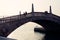 People silhouette at a brigde near San Marco Place in Venice