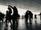People in silhouette dancing Lindy Hop