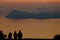People silhouette enjoying sunset