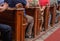 People sit in church benches religion