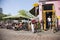 People sit and drink at outdoor cafe in city center of medieval utrecht in holland