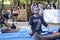 People sit on a ground and listen to guru preaching. Fest of Yoga and Vedic Culture Vedalife-2018