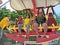 People sit in the open cabin ferris wheel in settlement Lazarevskoe Sochi