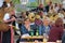 People sit together, at a parochial festivity in the countryside. Austria.