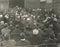 People sitting on benches in courtroom