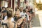 People sitting outdoors at Folk & Rovere bar, Bergen, Norway