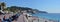 People sitting on the Promenade Des Anglais, Nice, France