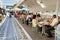 People sittting at a Greek Taverna in Volos, Greece.