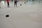 People skate on the ice hockey