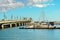 People in small boat, marine and Bridge of Lions in Florida`s Historic Coast .