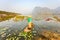 People with small boat on Van Long pond, Ninh Binh province, Vietnam