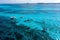 People snorkelling around the ship wreck near Bahamas in the Caribbean sea.