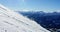 People snowboarding on snowy mountain