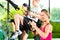 People in sport gym on suspension trainer