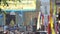 People spray holy water to the Buddha statue in Songkran parade