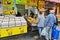 People stand in line for olives on Mahane Yehuda market in Jerusalem