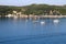 People on stand up paddle board and parasailing Valtos beach Parga