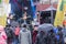 People standing in a crowd watching a band in the rain