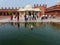 People standing in front of Tomb of Salim Chishti in the courtyard of Jama Masjid, Fatehpur Sikri, India.