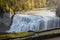 People standing overlooking Middle Falls at Letchworth State Park in upstate New York