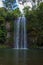 people standing under the milla milla falls and taking a shower, Queensland, Australia