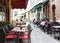 People in street cafe, old European tourist town