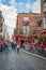 People in the street in front of the famous Temple Bar, in Dublin Ireland