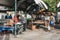 People at a street market selling handmade goods in Bridgetown, Barbados.