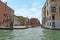 People on the street near bridge in Venice, Italy