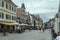 People stroll at pedestrian precinct in historical little town, Oberkirch, Germany