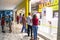 People stroll and shop in a shopping mall