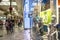 People stroll and shop in a shopping mall