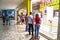 People stroll and shop in a shopping mall