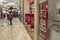 People stroll and shop in a shopping mall