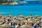 People sunbathing at Paguera Beach, Majorca, Spain