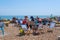 People on Sunny sands beach enjoying the beautiful sunshine